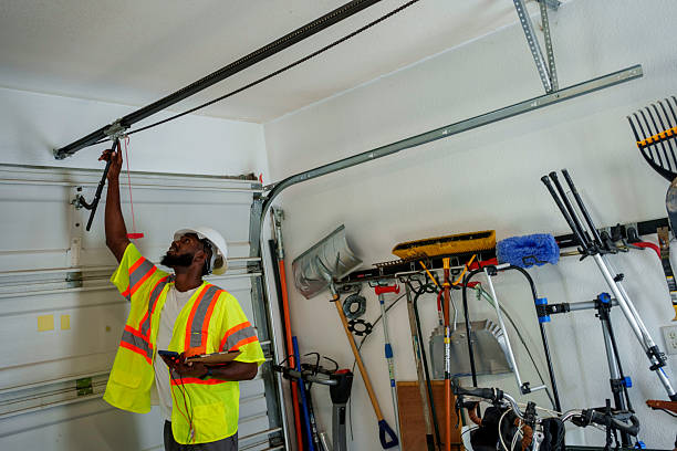 Professional Garage Door Panel Replacement technician working in Castlewood, VA